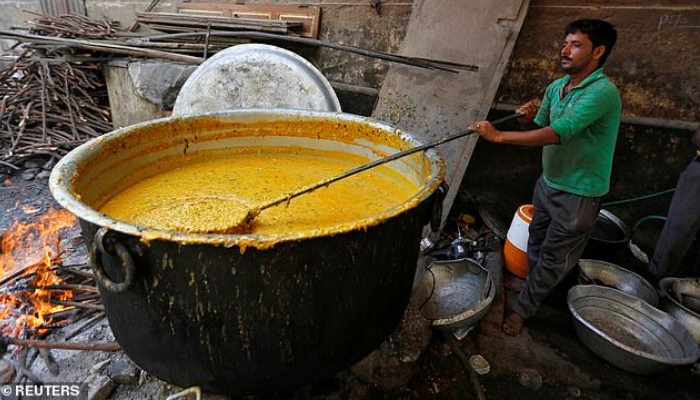 Three-year-old boy is killed after falling into a scalding pot of curry in India