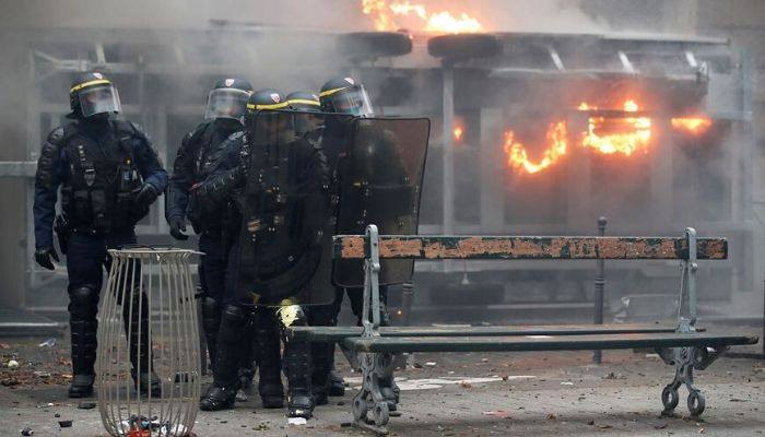 France: Police and protesters clash in massive strike over Macron's pension reform