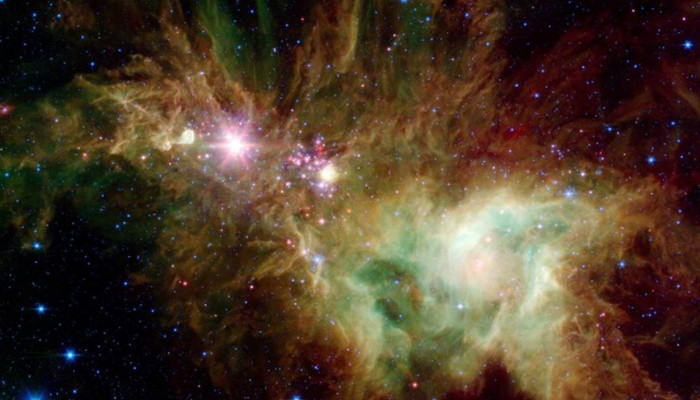 NASA photographed Christmas Tree star cluster with 'decorations'