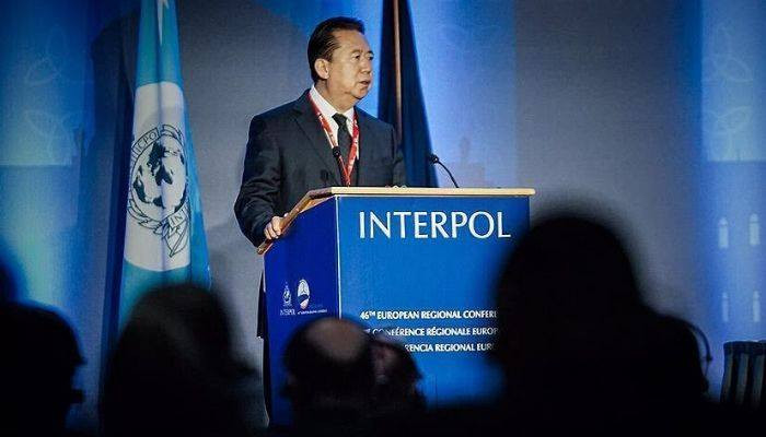 Chinese court sentences ex-Interpol chief to 13.5 years in jail — media