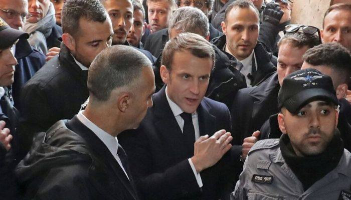 Furious Emmanuel Macron argues with Israeli police