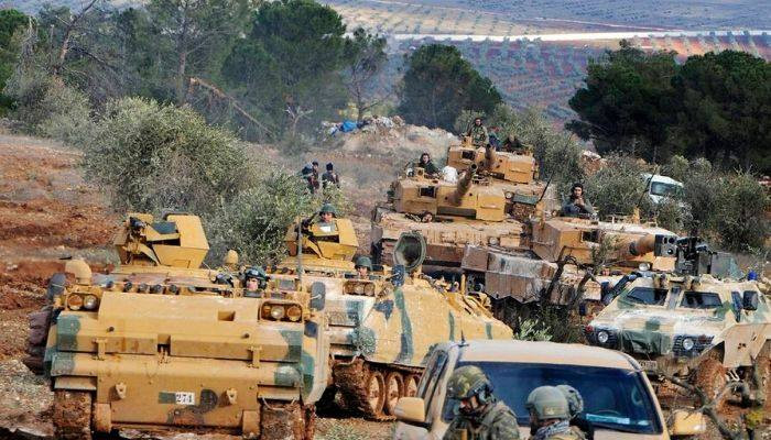 Turkish military convoy crosses Syria border, heads to southern Idlib