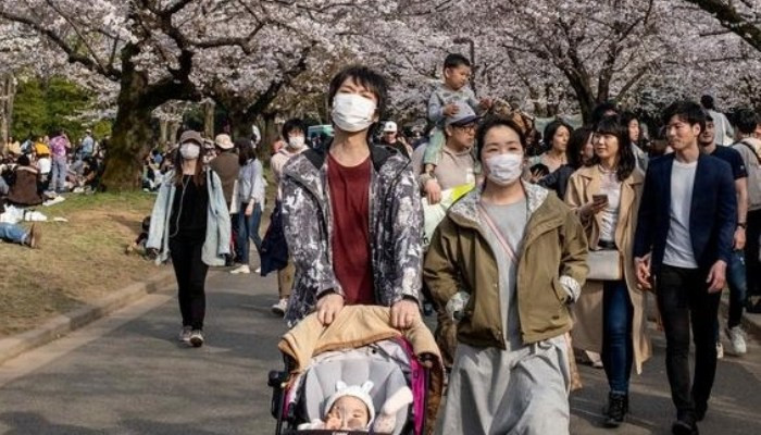 Japan aims to revive virus-hit tourism industry by footing bill