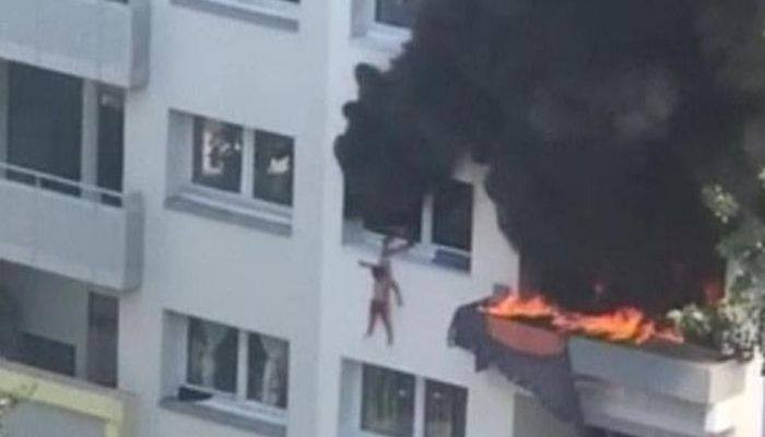 France apartment fire: crowd catches two children in three-storey fall