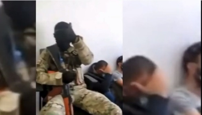 "Вооружён до зубов". Появилось видео из банка в Грузии, где неизвестный захватил заложников