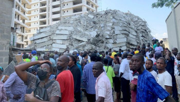 Nigeria building collapse kills at least 16; rescuers search on