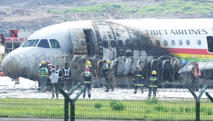 Chinese plane catches fire at airport during takeoff