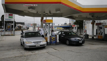 US gas prices rise to a record $5 a gallon but Biden hedges on Saudi Arabia visit