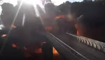 Moment missile strikes Kyiv pedestrian bridge