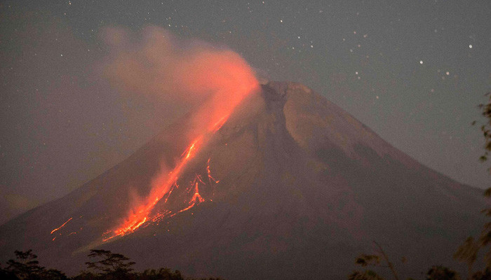 A volcano erupts in Indonesia