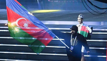 Азербайджанские тяжелоатлеты возвращаются из Еревана