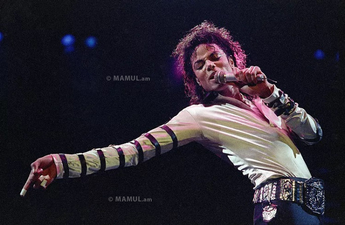 Michael Jackson leans, points and sings, dances and struts during the opening performance of his 13-city U.S. tour, Tuesday, Feb. 24, 1988, in Kansas City.Cliff Schiappa/AP