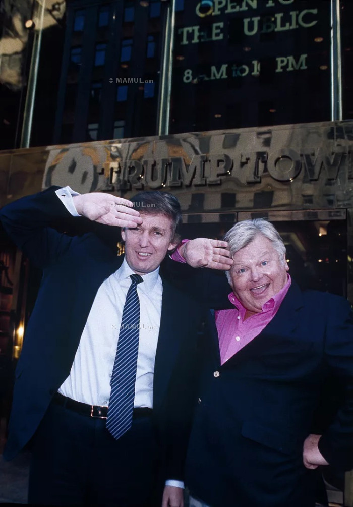Donald Trump, left, mimics the trademark Benny Hill salute as he and Hill pose for a photo in front of Trump Tower in New York, Nov. 17, 1989.Richard DrewAP