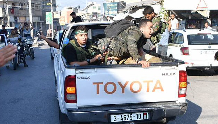 Death toll from Hamas onslaught passes 700, over 100 kidnapped