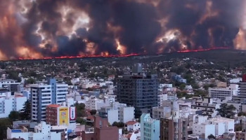 Dozens flee raging Argentina wildfires ‘started by man making coffee’