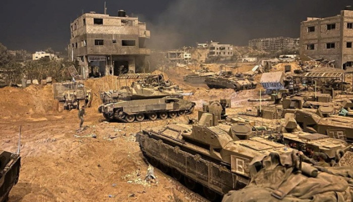 Israeli army at ‘gates of Gaza City’ as Biden calls for pause in fighting