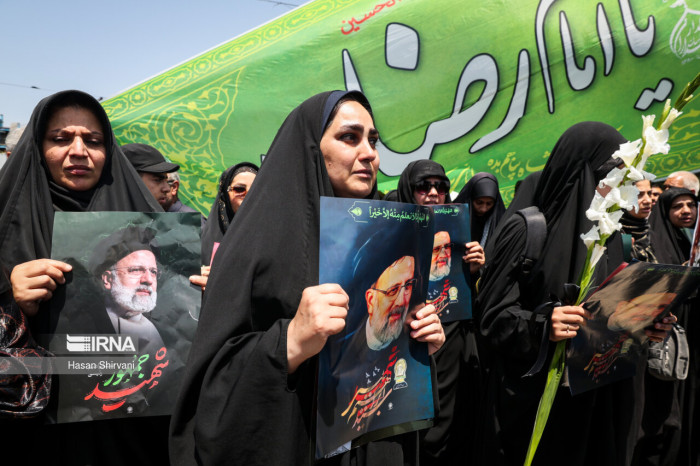 President Raeisi's body arrives at Mashhad for burial
