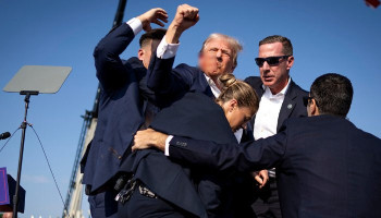 Trump changes 'humdinger' of a speech after assassination attempt as he arrives in Milwaukee for Republican National Convention