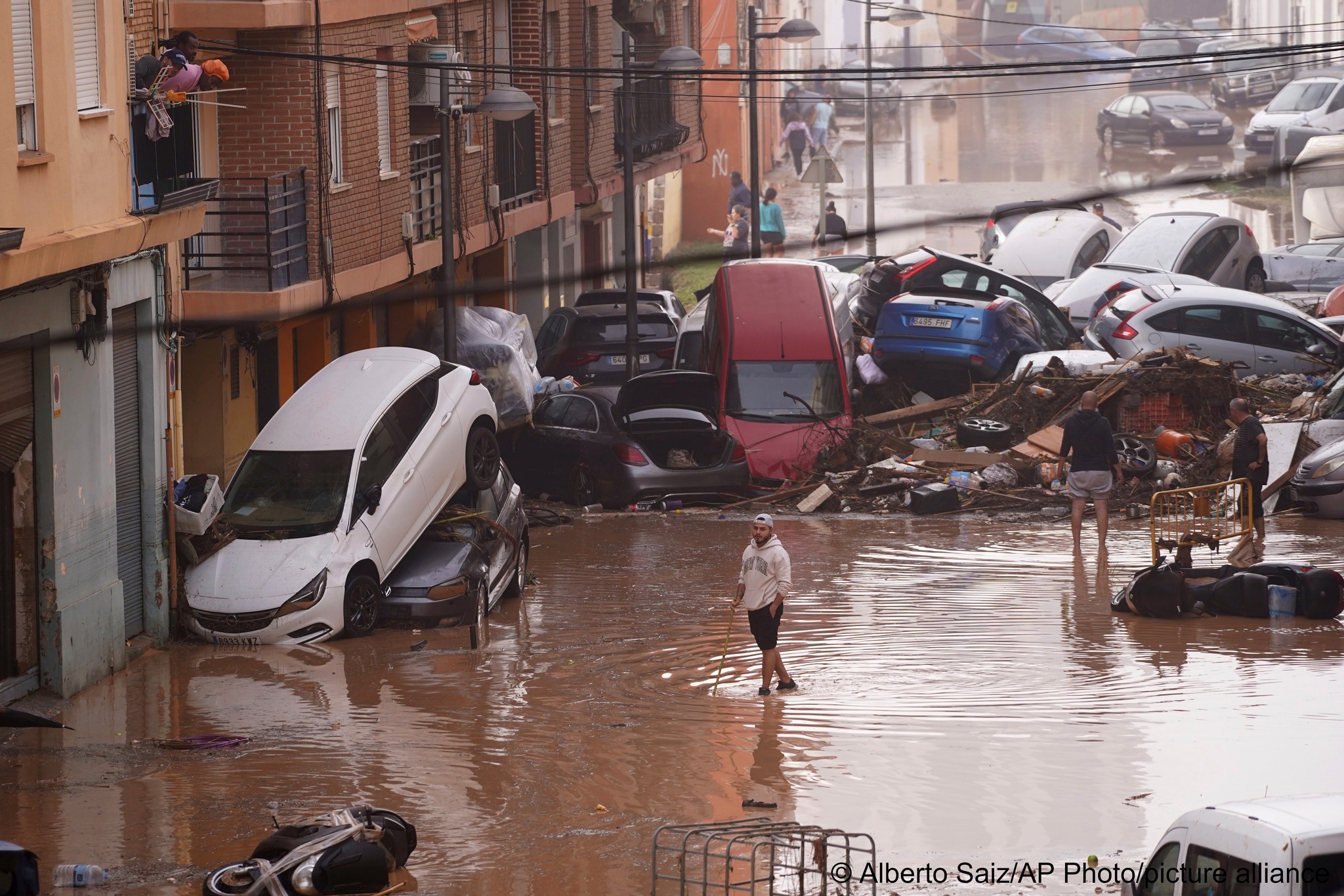 Spain declares three days of mourning as floods kill at least 72 people in Valencia region