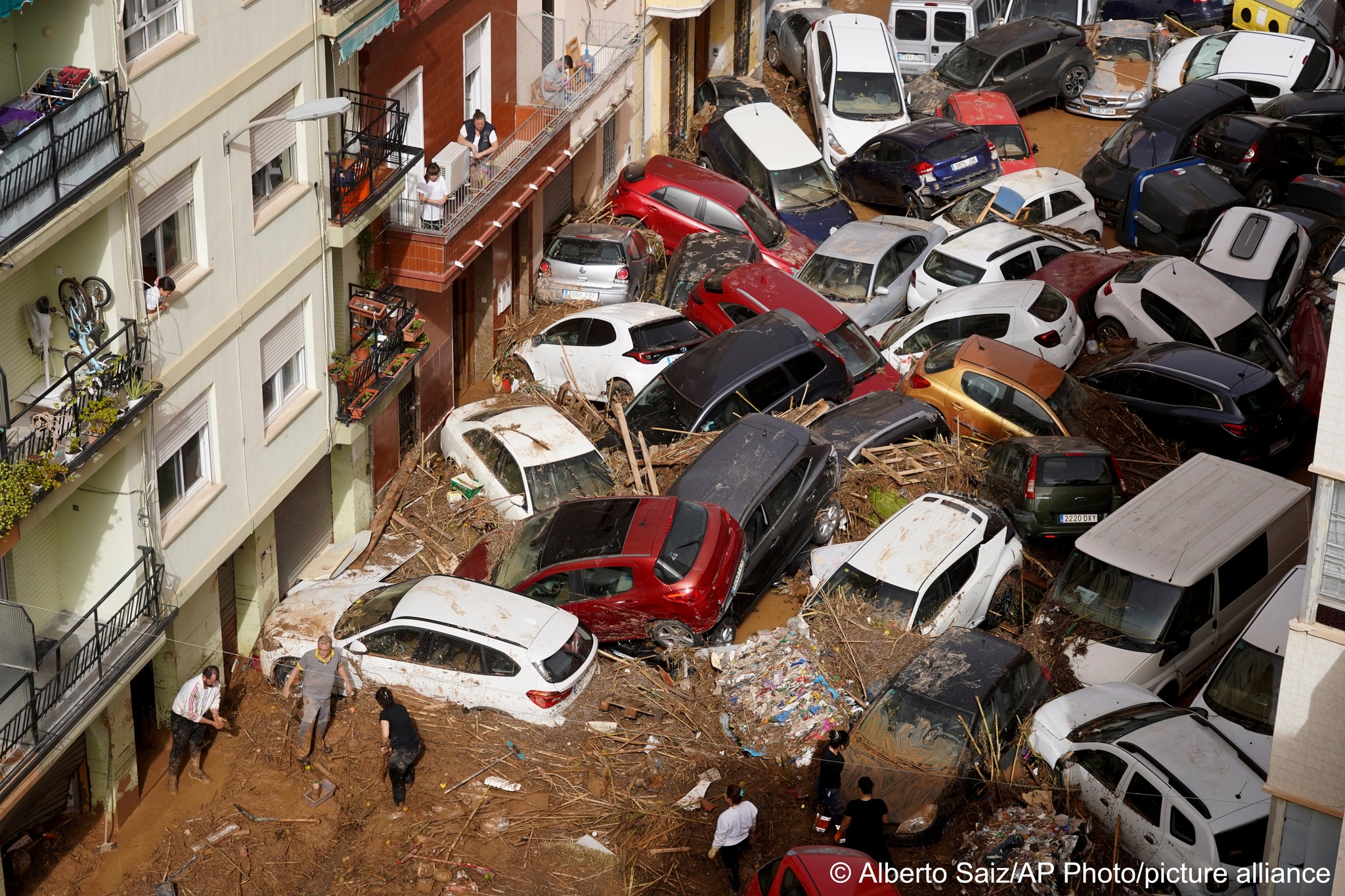 Spain declares three days of mourning as floods kill at least 72 people in Valencia region