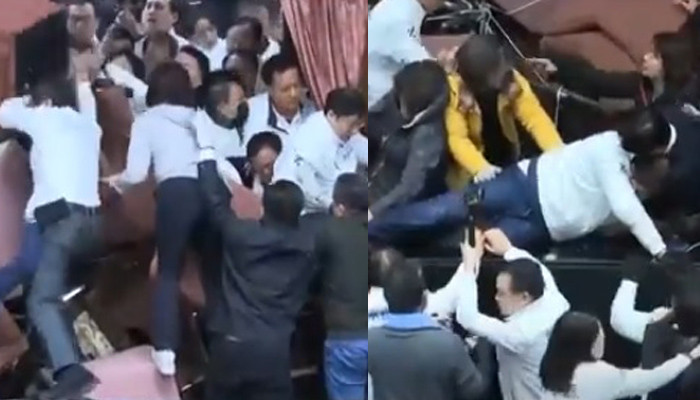 Taiwan lawmakers clash after one party breaks into legislature to occupy speaker’s chair