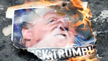 Protesters in Panama burn portrait of Trump and American flag